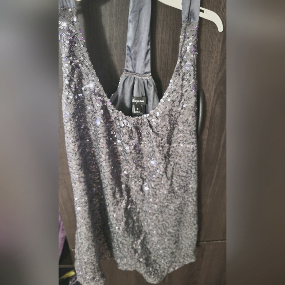 Express tank top, shirt. Silver with shiny sequence.  Silky under the sequence.
